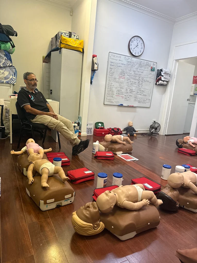 First aid training Awais session in Sydney with CPR mannequins and trainer